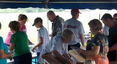 Families at food tent at KidStuff event