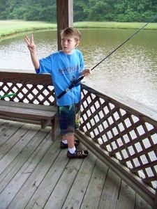 Child fishing at KidStuff event